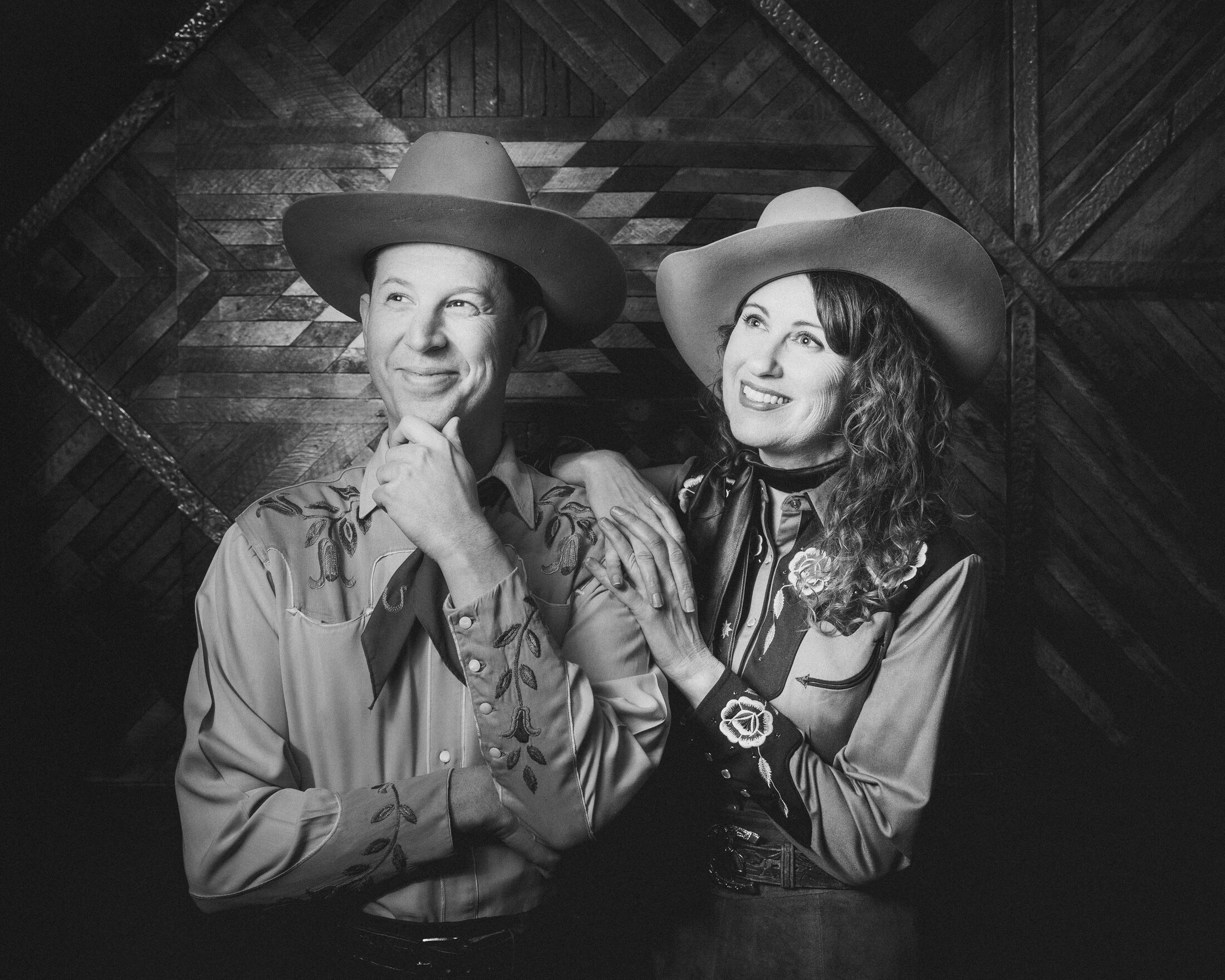 The Farmer and Adele together in a black-and-white portrait