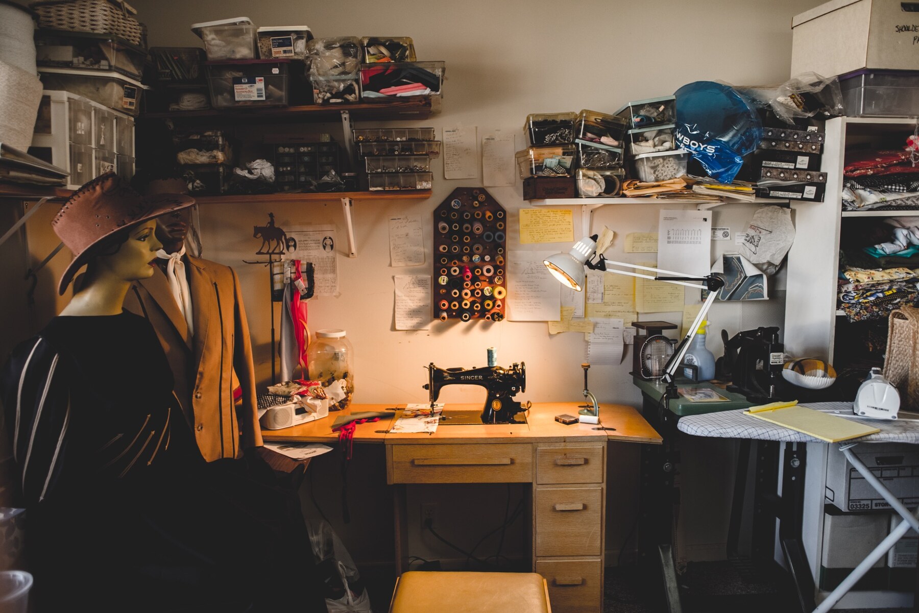 Riley's worktable, sewing machine and studio wall