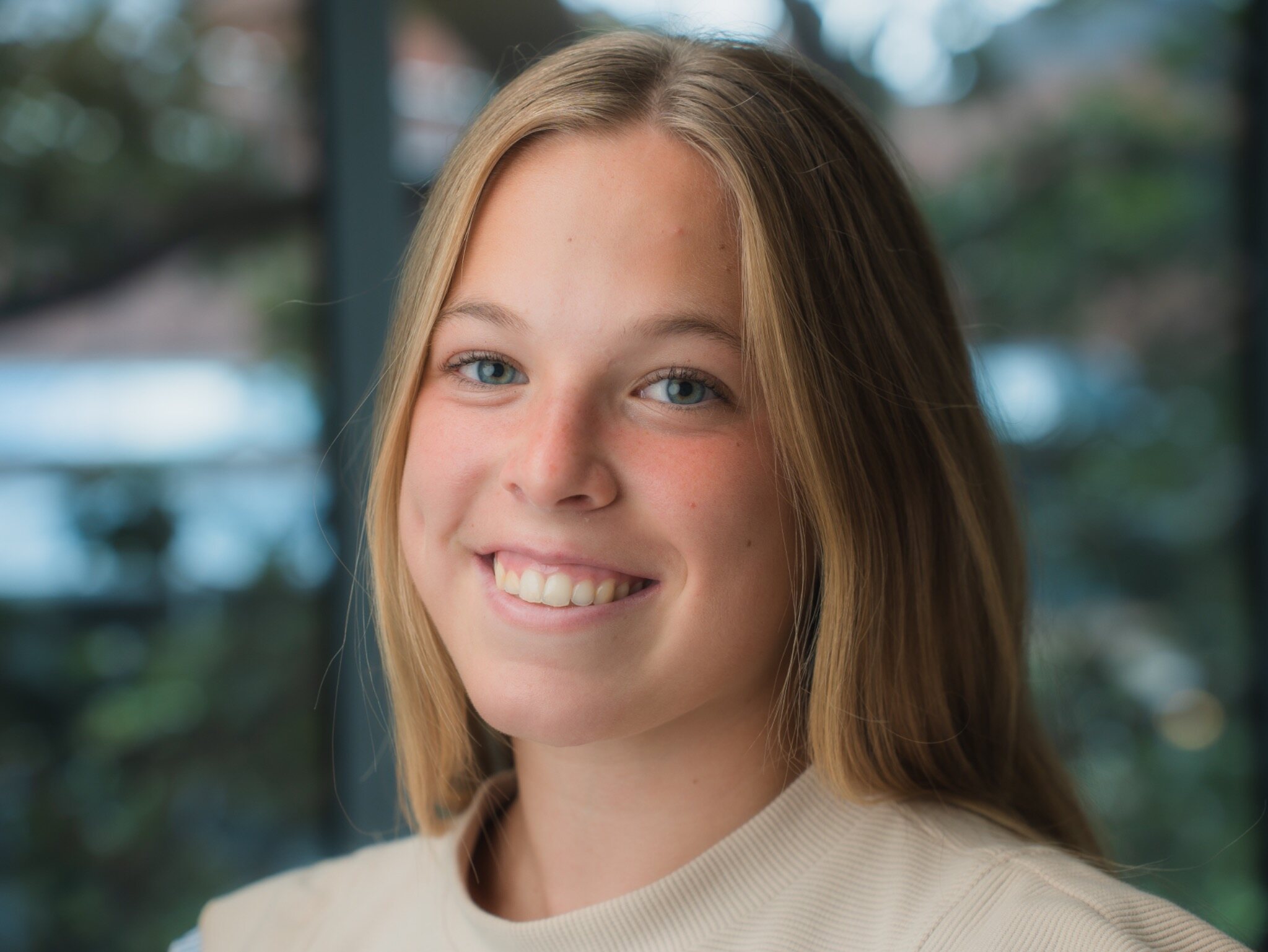 Young woman photographed in soft window light