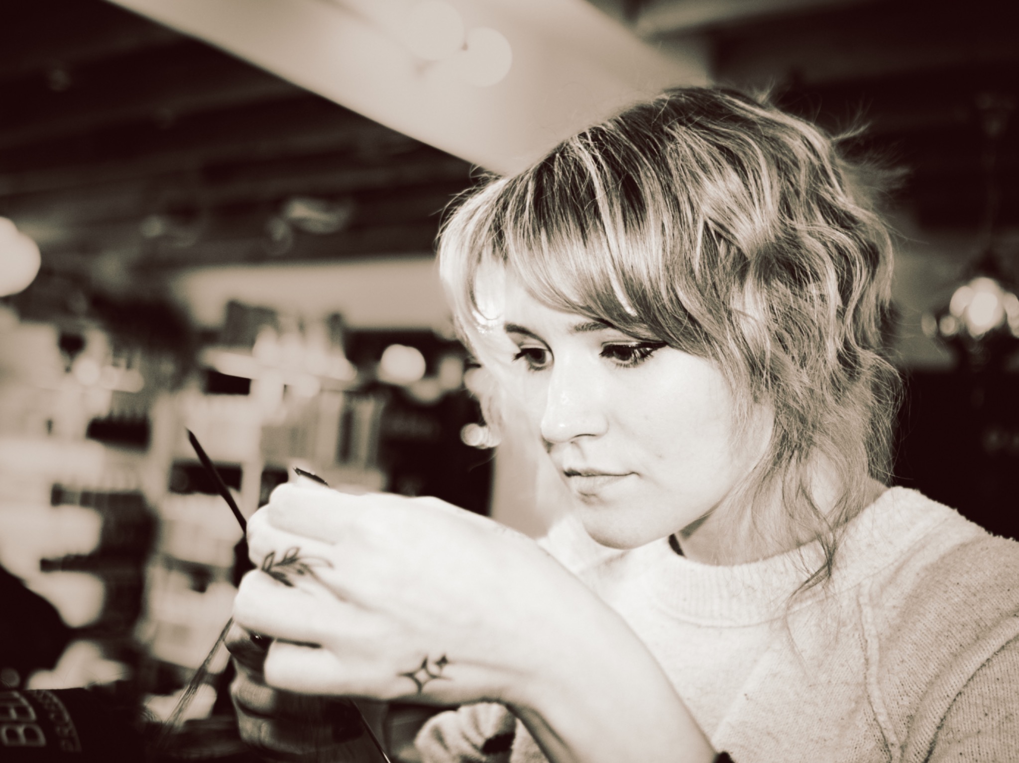A Walden stylist focused on her work